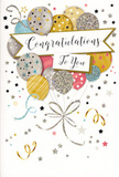 This congratulations card design feels like a compact celebration, reminiscent of walking into a decorated room in Grays just as the congratulations begin. Dominating the scene is a charming bundle of illustrated balloons, gathered in a loose, upward-reaching cluster. The colours blend harmoniously: warm gold and soft champagne, cool silver, sky blue, blush pink, and a calm grey, with each balloon given its own delicate decoration. Some shimmer with tiny metallic stars scattered across their surface, others show vertical stripes or a fine dusting of glitter-like patterning, making them look slightly reflective, as though catching evening light from a nearby window. Thin, swirling ribbons descend gracefully from the base of the bouquet, their lines picked out in tones that suggest gold and silver foil, curling across a pale background. This backdrop is speckled with small star shapes and floating confetti dots, layered lightly so the design never feels crowded, just pleasantly festive. Across the middle of the card, a gently unfurled banner carries the phrase Congratulations To You in elegant, flowing handwriting-style lettering that immediately draws the eye. The overall impression is one of thoughtful joy: polished yet warm, ideal for marking the kind of moments that prompt flowers and cards to be sent across Grays, from exam success to new job celebrations. Though you can't feel it through the screen, the careful illustration hints at a luxurious, slightly textured print finish, like the kind of card a local florist would choose to accompany a fresh bouquet when helping families and friends share their pride.